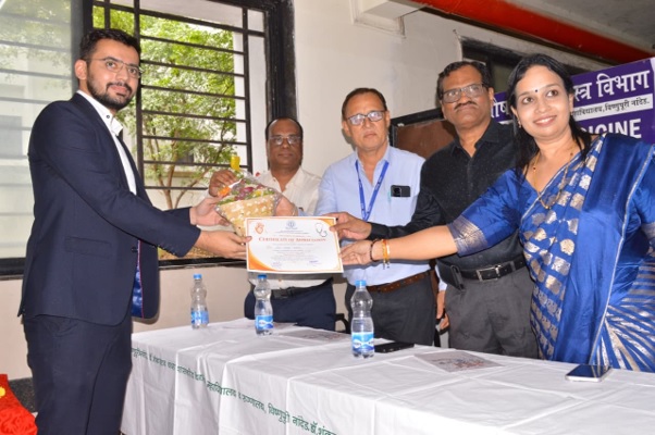 Resident Dr. Dev Atara being felicitated for clearing MRCP Part 1